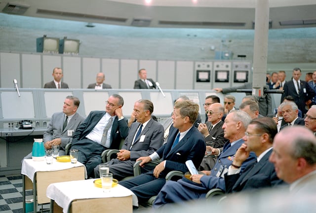 Kennedy (front row, middle) during a tour of Blockhouse 34 at the Cape Canaveral Missile Test Annex