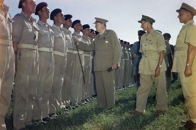 Winston Churchill inspecting men of the 4th Queen's Own Hussars at Loreto aerodrome, Italy, 25 August 1944