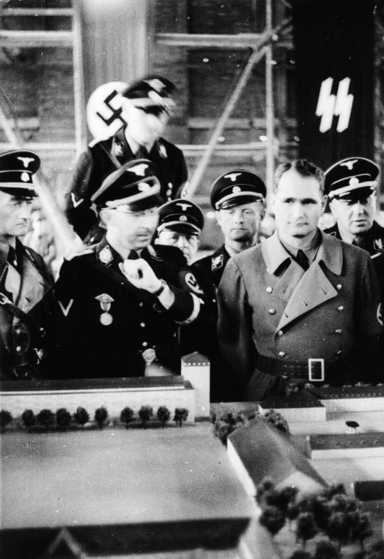 Himmler and Rudolf Hess in 1936, viewing a scale model of Dachau concentration camp