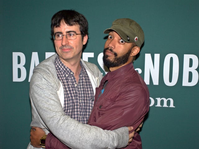 Former correspondents John Oliver and Wyatt Cenac at the launch of Earth (The Book): A Visitor's Guide to the Human Race