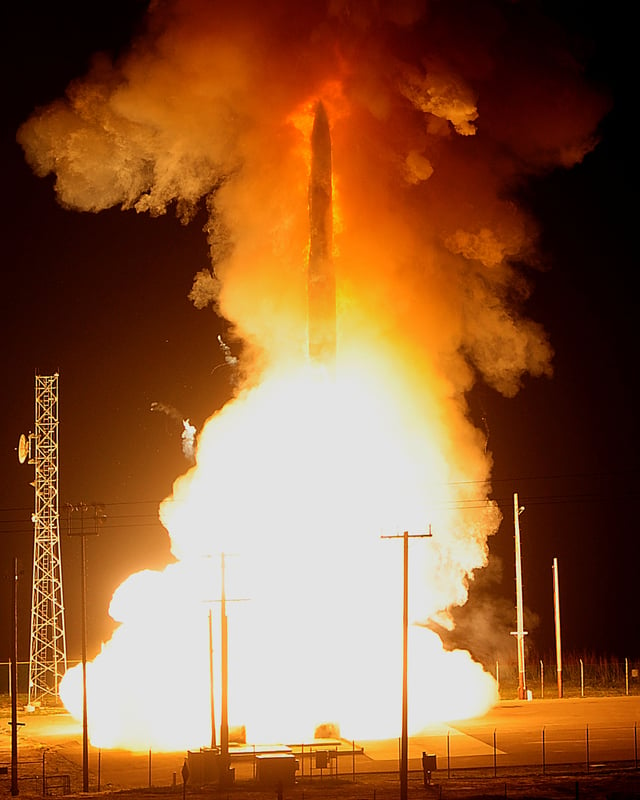 An unarmed Minuteman III ICBM shoots out of the silo during an operational test launch