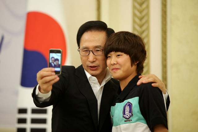 Former South Korean President Lee Myung-Bak and footballer Ji So Yun