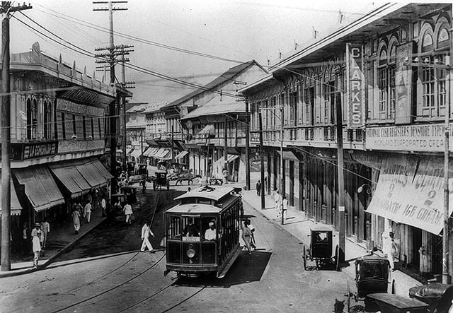 Tram running along Escolta Street during the American period.