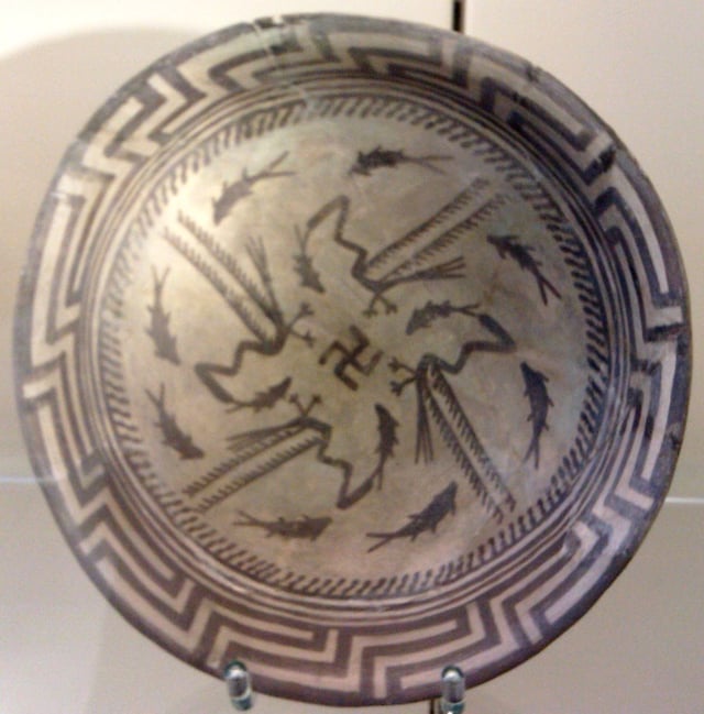 The Samarra bowl, at the Pergamonmuseum, Berlin. The swastika in the center of the design is a reconstruction.