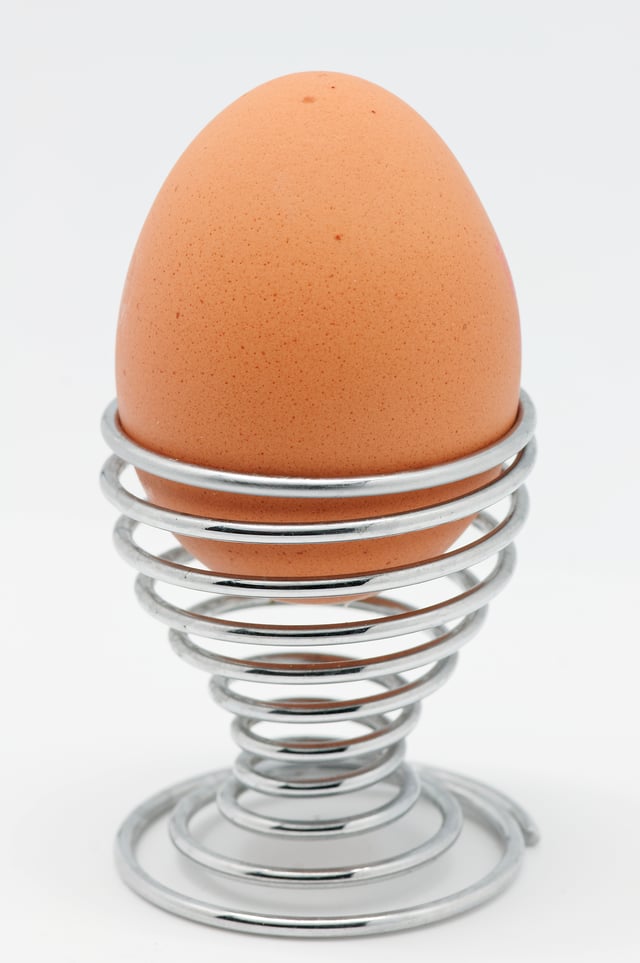 A boiled egg, presented in an eggcup