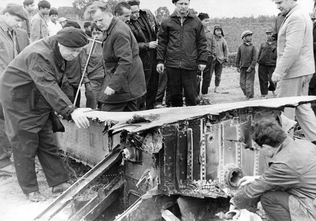 Russian advisers inspecting the debris of a B-52 downed in the vicinity of Hanoi