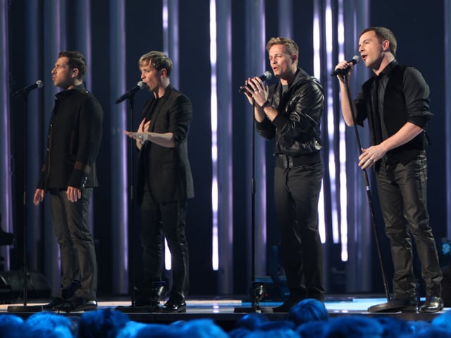 Irish boy band Westlife achieved the first official number one on the UK Singles Downloads Chart with "Flying Without Wings" in September 2004.