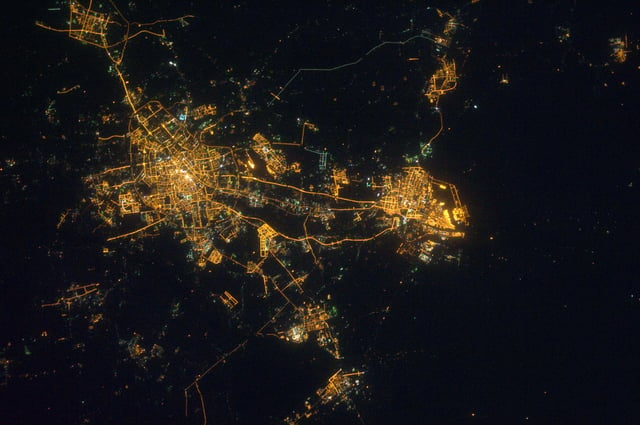 2011 satellite image of Tianjin. The city center was on the left, while the smaller urban area to the right was the Binhai New Area.