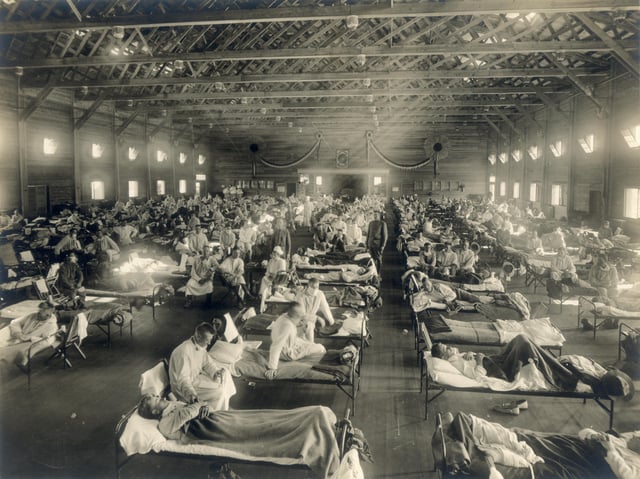 Emergency military hospital during the Spanish flu pandemic, which killed about 675,000 people in the United States alone, Camp Funston, Kansas, 1918