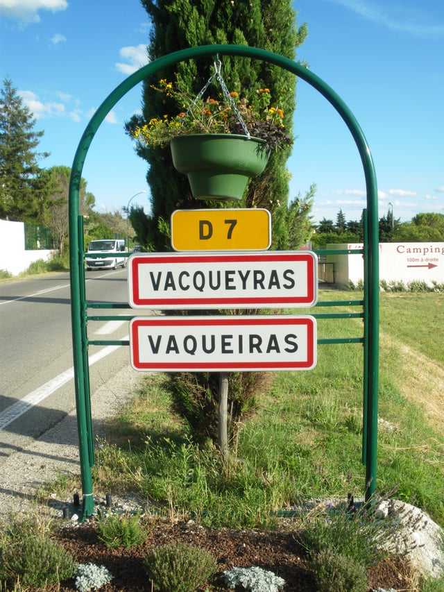 Vacqueyras in Provence,showing double French/Provençal name