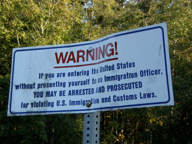 A sign at the International Boundary in Point Roberts, Washington, warning against illegal crossing of the border