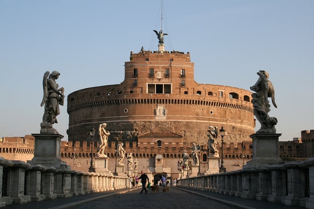 Castel Sant'Angelo or Hadrian's Mausoleum, it's a Roman monument radically altered in the Middle Ages and the Renaissance, here Pope Alexander VI secluded himself, from the Ponte Sant'Angelo built in year 134 crowned with 16th and 17th centuries' statues.