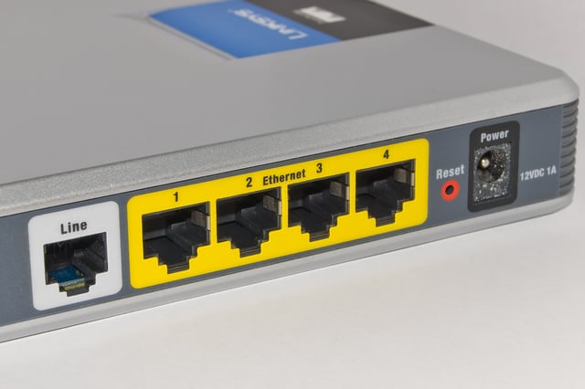 A typical home or small office router showing the ADSL telephone line and Ethernet network cable connections