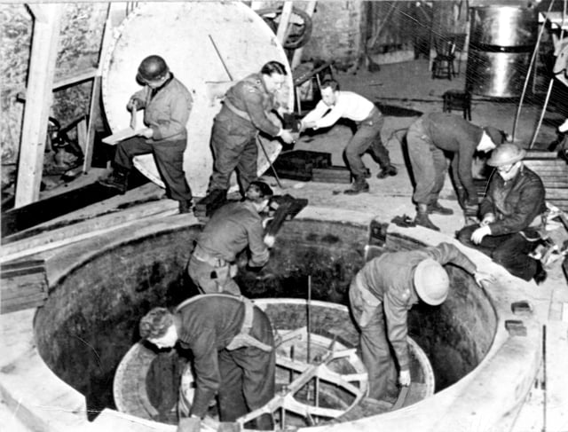Allied soldiers dismantle the German experimental nuclear reactor at Haigerloch.
