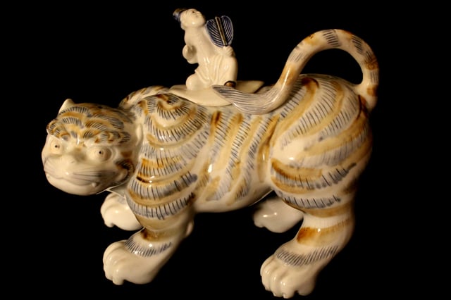 Hirado ware porcelain censers in the form of tiger and figurine with fan, brown and blue glazes
