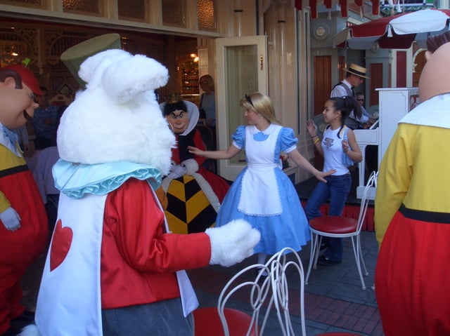 Alice and characters from her movie host "Disneyland Musical Chairs" at Coca-Cola Refreshment Corner, accompanied by a ragtime pianist