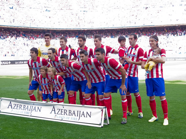 Atlético players with kits stating "Azerbaijan Land of Fire"