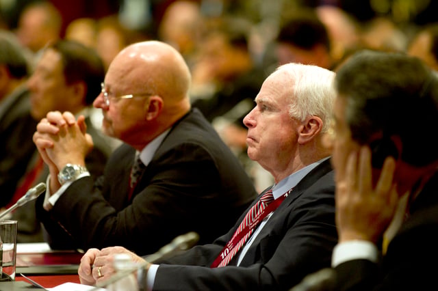 Clapper and Senator John McCain listen as Defense Secretary Gates addresses the audience, June 4, 2011
