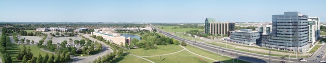 Skyline of Markham viewed from Highway 7 and Town Centre Blvd. Unionville High School, FLATO Markham Theatre, and City Hall are the three buildings to the left. (2008)