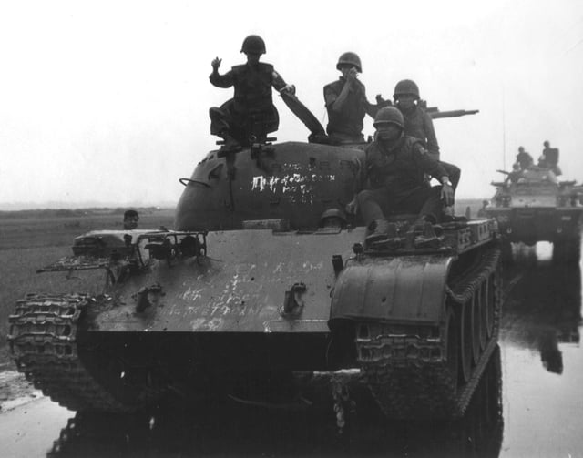 ARVN soldiers posing on top of a Type 59 tank