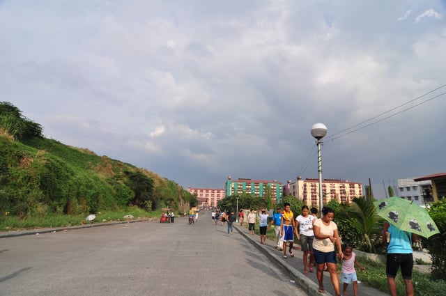 The Smokey Mountain Housing Project was built on a former landfill. Continuous development of housing buildings continues up to the present day.