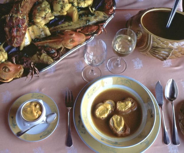 A traditional bouillabaisse from Marseille, with the fish served separately from the soup