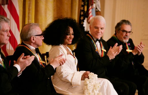 Diana Ross is applauded by her fellow Kennedy Center honorees as she is recognized for her career achievements by President George W. Bush in the East Room of the White House Sunday, December 2, 2007, during the Kennedy Center Gala Reception. From left to right: singer-songwriter Brian Wilson; filmmaker Martin Scorsese; Ross; comedian, actor and author Steve Martin, and pianist Leon Fleisher.
