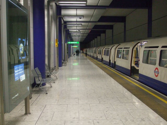 A 1973 Stock London Underground Piccadilly line train on Platform 6 at Terminal 5