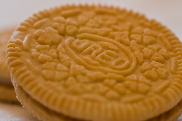 Close-up view of a golden Oreo cookie wafer