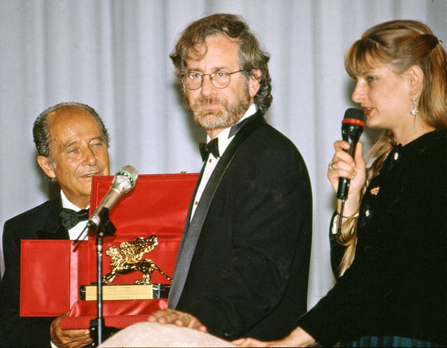 Spielberg receiving the Golden Lion by Italian filmmaker Gillo Pontecorvo at the 50th Venice International Film Festival, 1993