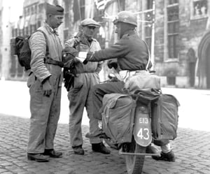 Members of the Belgian Resistance with a Canadian soldier in Bruges, September 1944 during the Battle of the Scheldt
