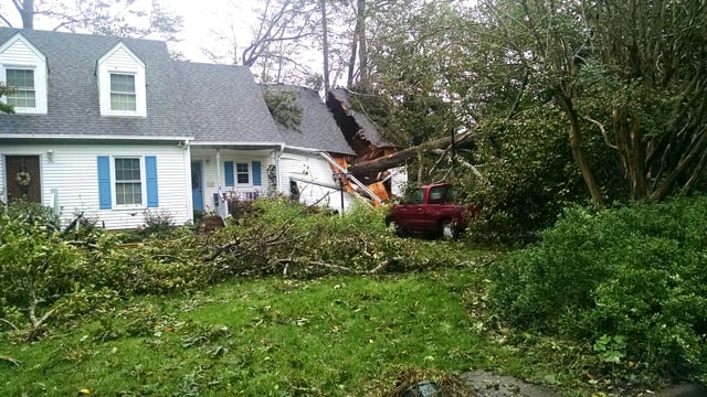 Heavy rains and high winds resulted in trees falling and record flooding in Lago Mar, Virginia Beach, Virginia.