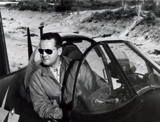 Lynn Garrison in cockpit of his F4U-7 Corsair 1966