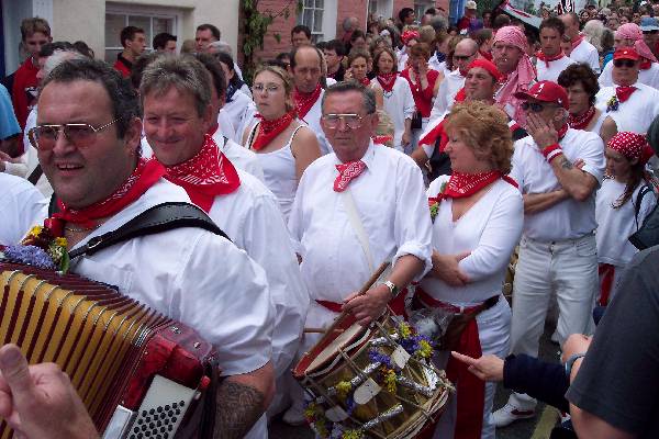 The Old 'Oss party attending the 'Obby 'Oss with dozens of accordions and drums.