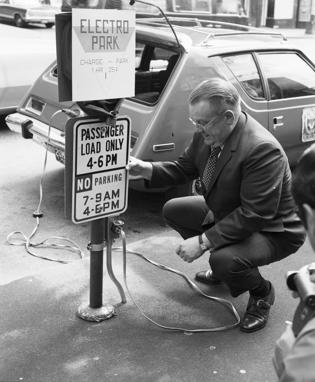 This 1973 photo of a charging station in Seattle shows an AMC Gremlin modified to take electric power; it had a range of about 50 miles on one charge.