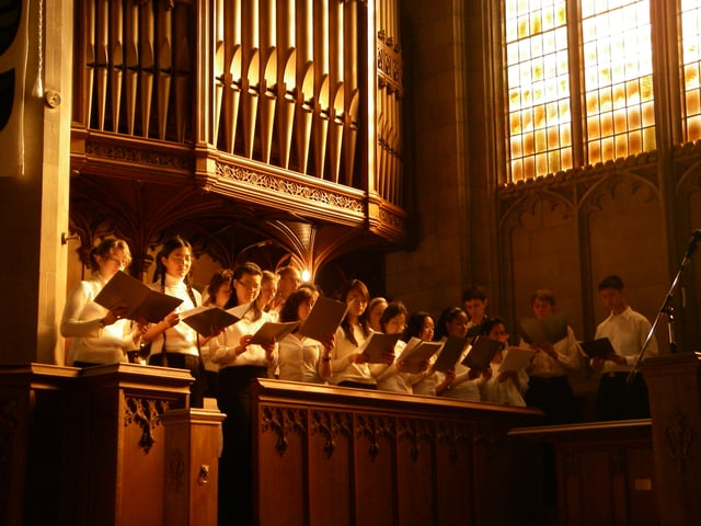 Sunlight fills Knox College Chapel during a Christmas concert of the engineering faculty's Skule Choir.