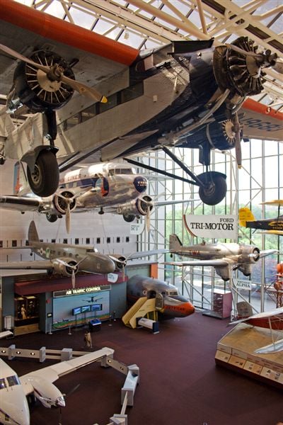 Aircraft on display at the National Air and Space Museum, including a Ford Trimotor and Douglas DC-3 (top and second from top)