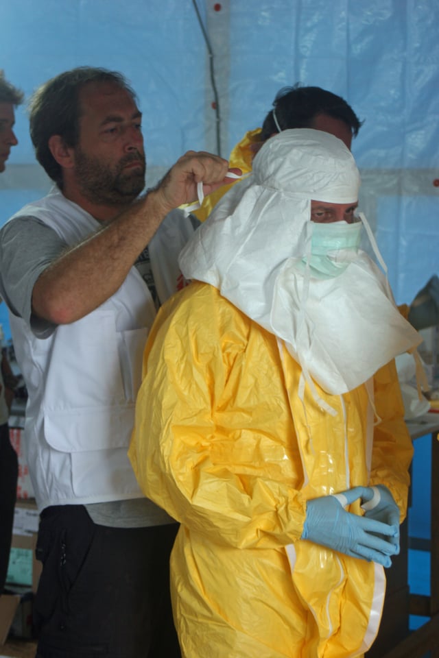 CDC and MSF staff preparing to enter an Ebola treatment unit in Liberia, August 2014