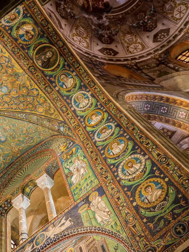 Triumphal arch mosaics of Jesus Christ and the Apostles. In Basilica of San Vitale in Ravenna, Italy.