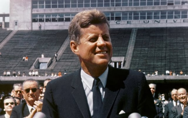 Kennedy speaking at Rice University in Houston on September 12, 1962. Vice President Lyndon B. Johnson can be seen behind him.