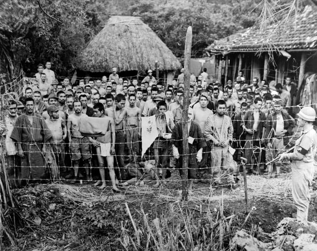 A group of Japanese prisoners taken on the island of Okuku in June 1945