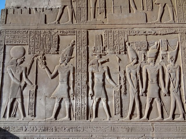 Relief from the temple of Kom Ombo depicting Ptolemy VIII receiving the sed symbol from Horus.