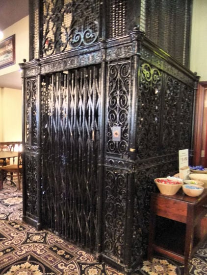 Otis elevator in Glasgow, Scotland, imported from the U.S. in 1856 for Gardner's Warehouse, the oldest cast-iron fronted building in the British Isles.