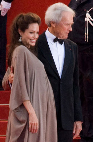A pregnant Jolie with director Clint Eastwood at the Cannes premiere of Changeling in May 2008