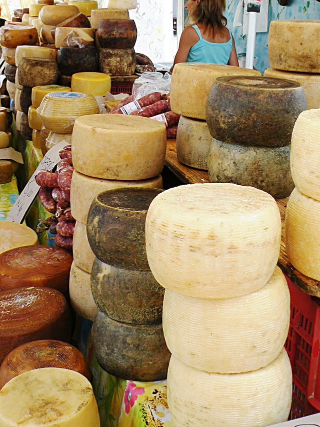 Cheeses and sausages in Alghero's city market