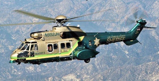 The AS332 Super Puma flying a SAR mission
