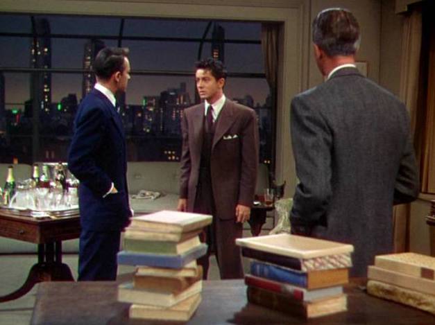 A typical shot from Rope (1948) with James Stewart turning his back to the fixed camera