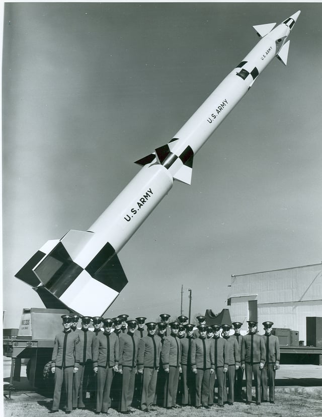 West Point Cadets pose in front of a Zeus B at White Sands. The three stages of the missile are clearly evident, as well as details of the movable upper stage thrusters.
