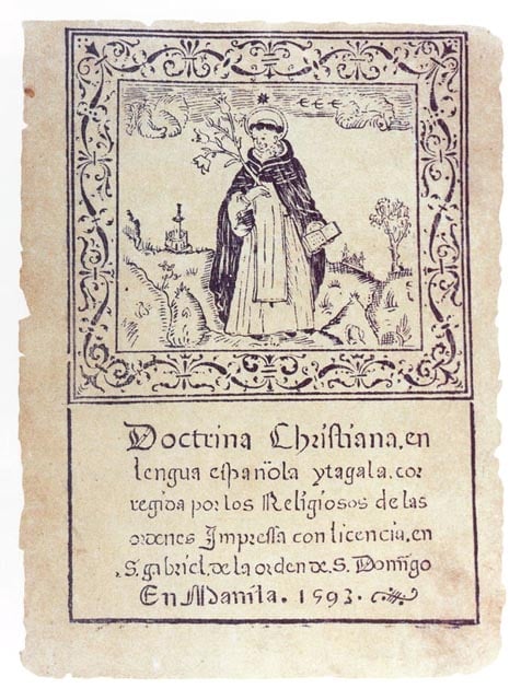 Saint Dominic on the front cover of Doctrina Christiana catechism in Spanish and Tagalog with an eight-pointed star (a symbol of the Blessed Virgin Mary) over his head. Woodcut cover. Printed in Manila in 1593