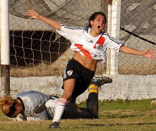 María Pía Gomez scoring a goal for the women's team in 2011